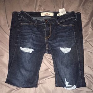 Hollister ripped skinny jeans.